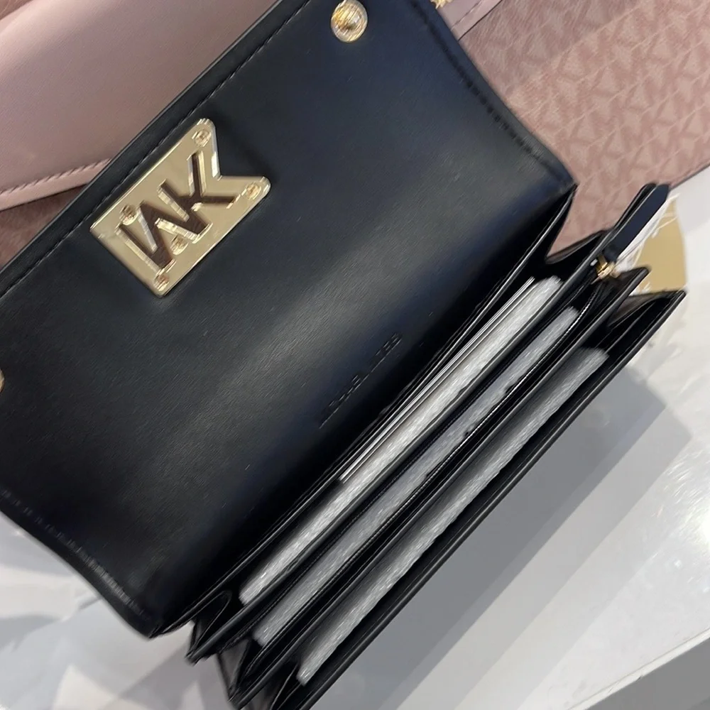 Michael Kors Mimi Large Saffiano Leather Bi-Fold Continental Wallet
Black 
NWT - Picture 11 of 16